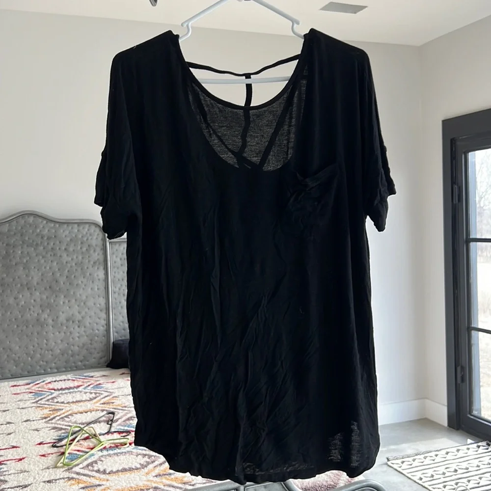 Black tunic T with cutout design on back. - Picture 1 of 3